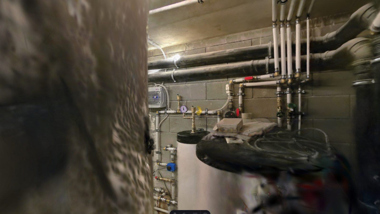 A plant room as a photoreal copy in a browser, pipes and valves visible.